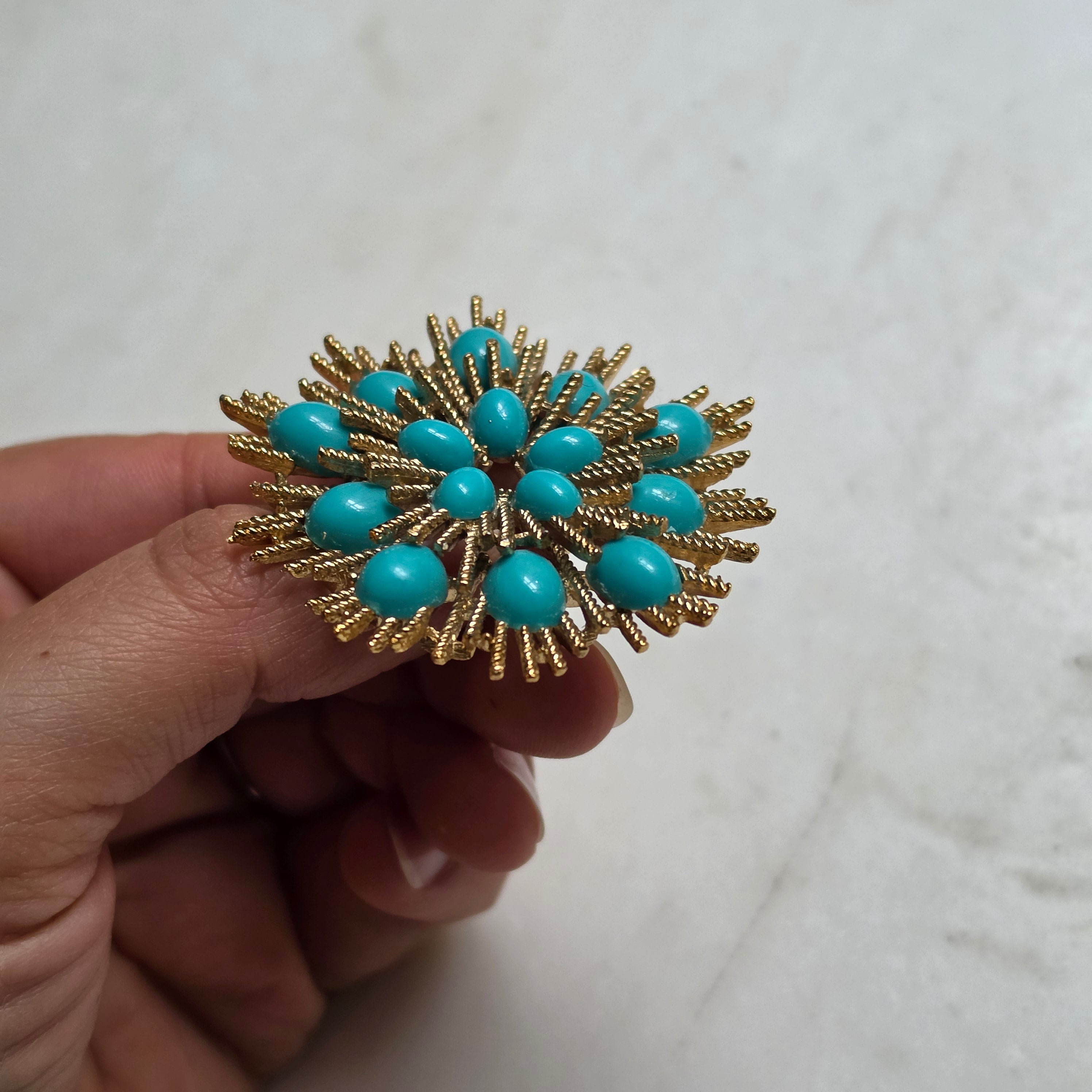 Vintage Avon Broosche mit Türkissteinen – Starburst Design