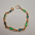 Goldenes Vintage Armband mit grünen blauen Emaille-Fischen 70er Jahre