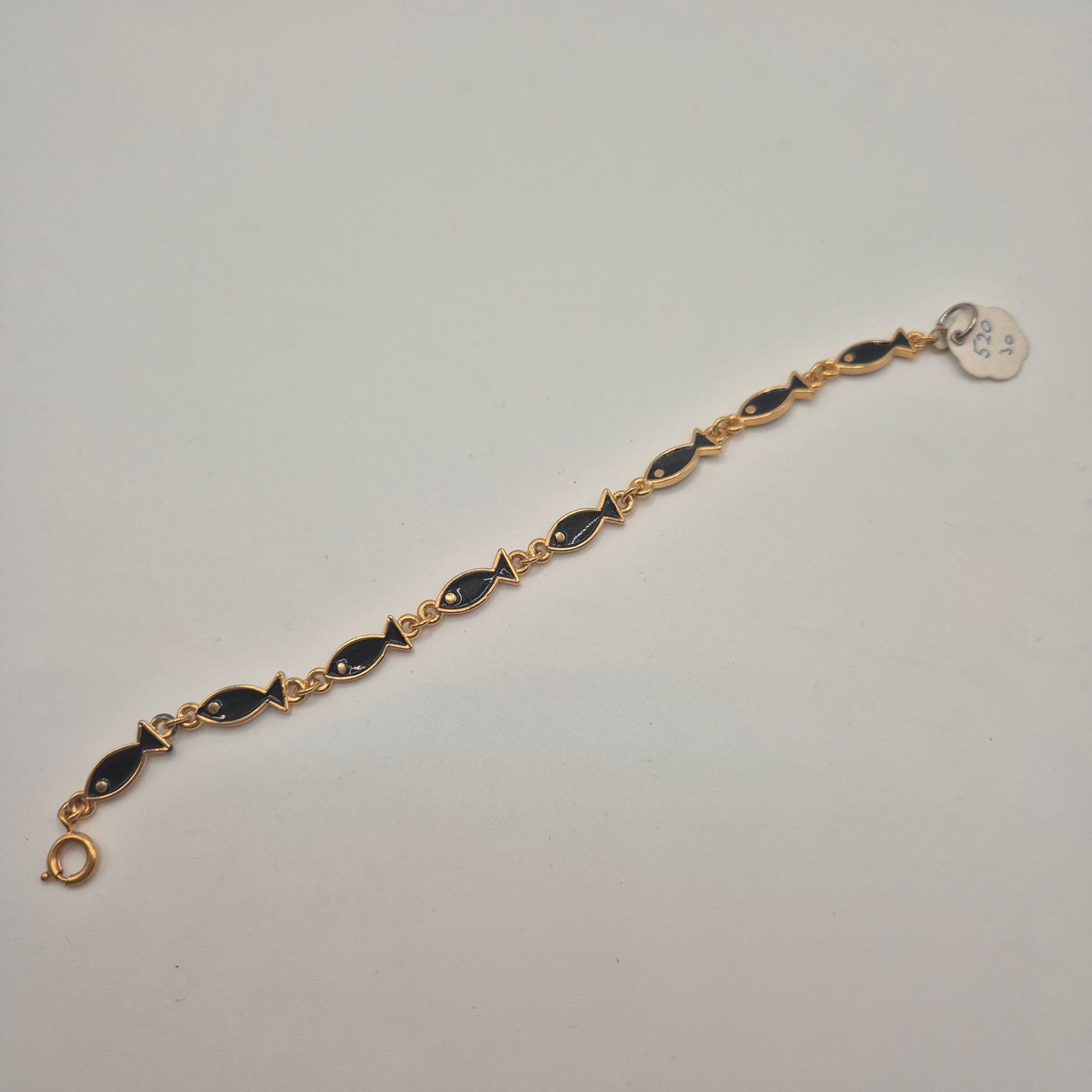 Goldenes Vintage Armband mit schwarzen Emaille-Fischen 70er Jahre