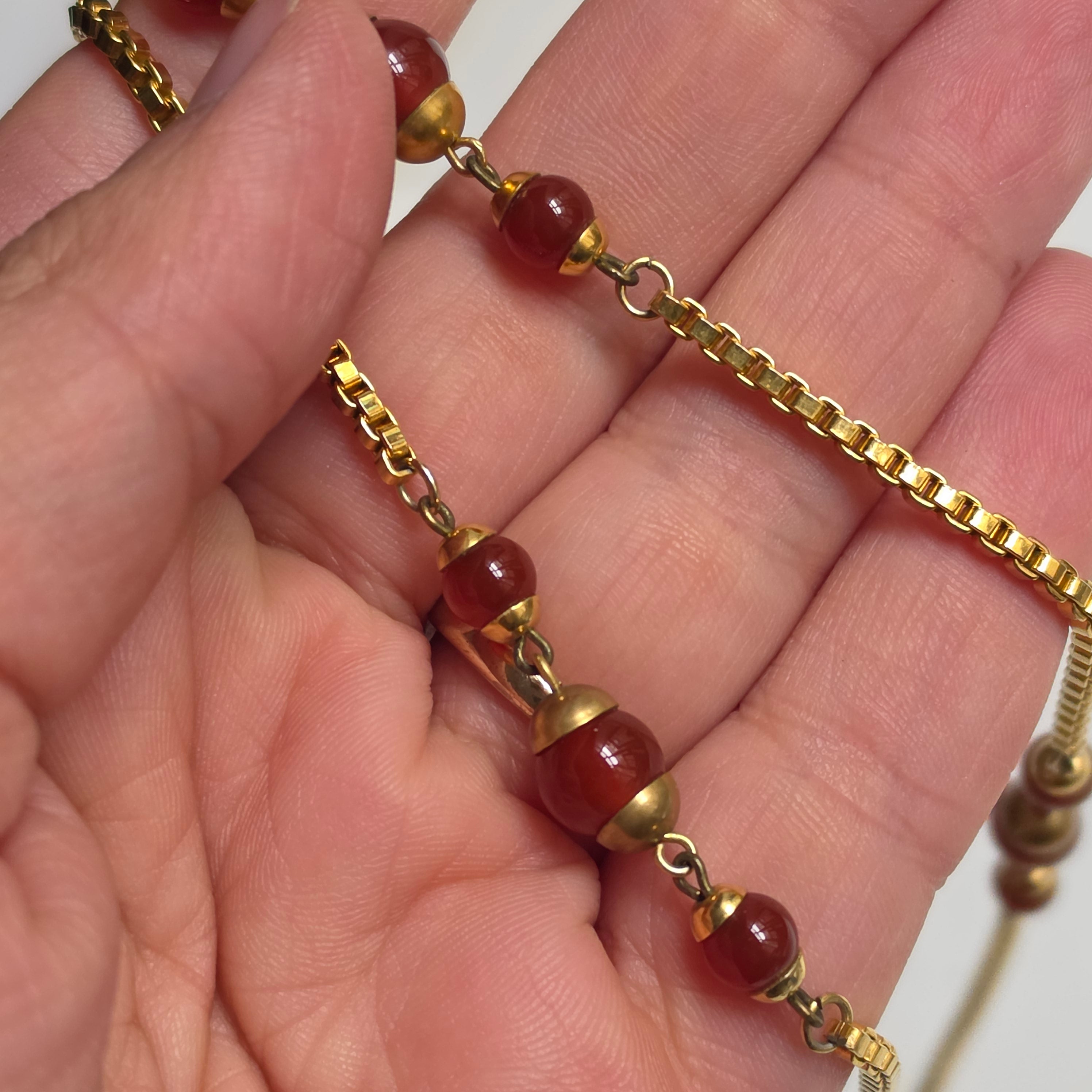 Statement-Kette im Art-Deco-Look – Rot & Goldfarben