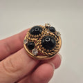 Vintage Brosche 50er Jahre gold schwarz Strassseine rund edel