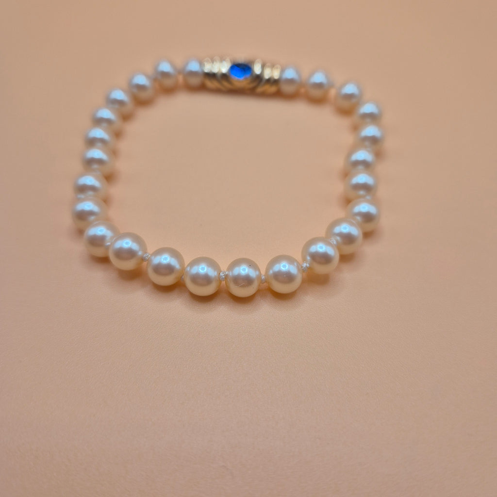 Vintage unechtes Perlenarmband mit blauem Stein 80er Jahre