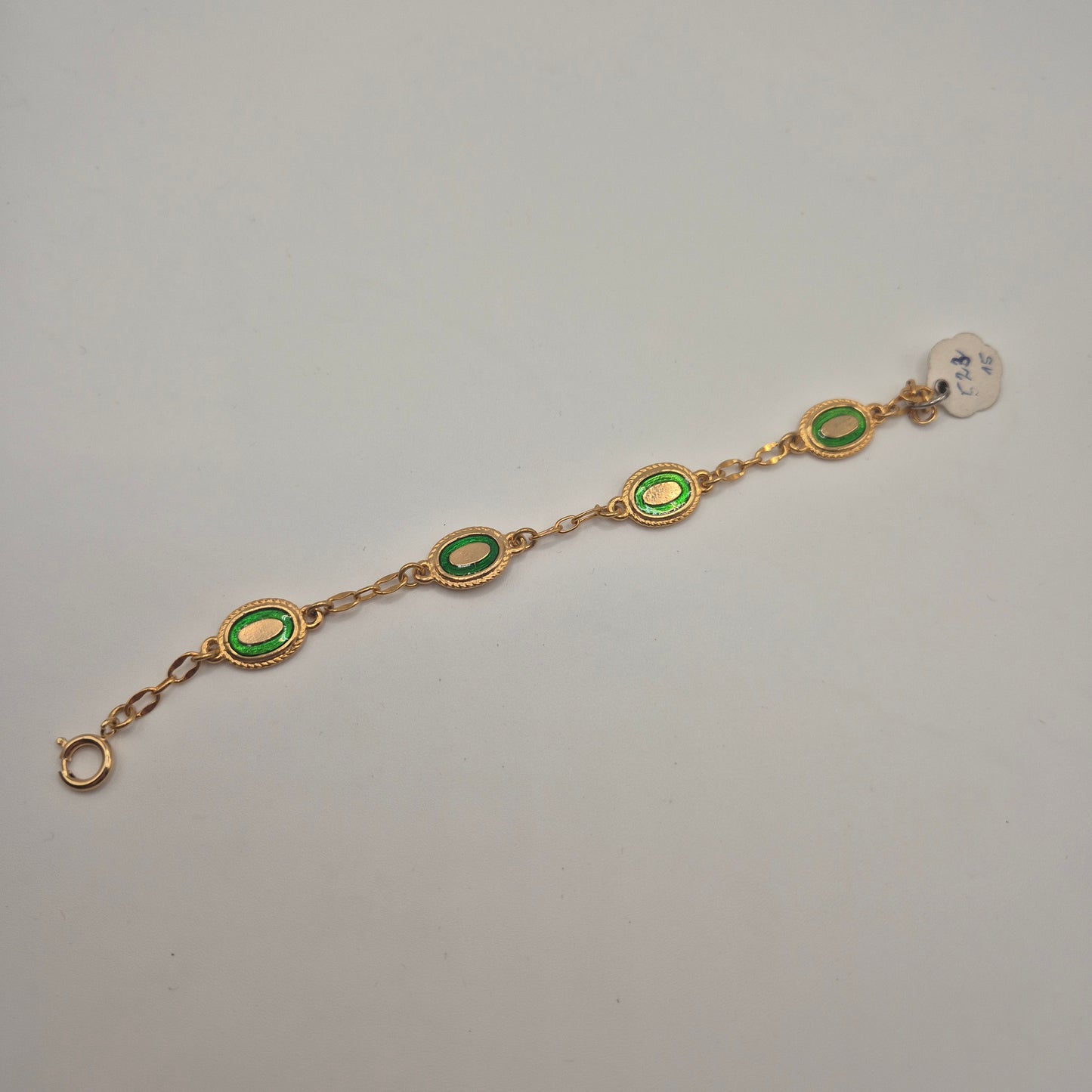 Goldenes Vintage Armband mit grünen Emaille-Ovalen 70er Jahre