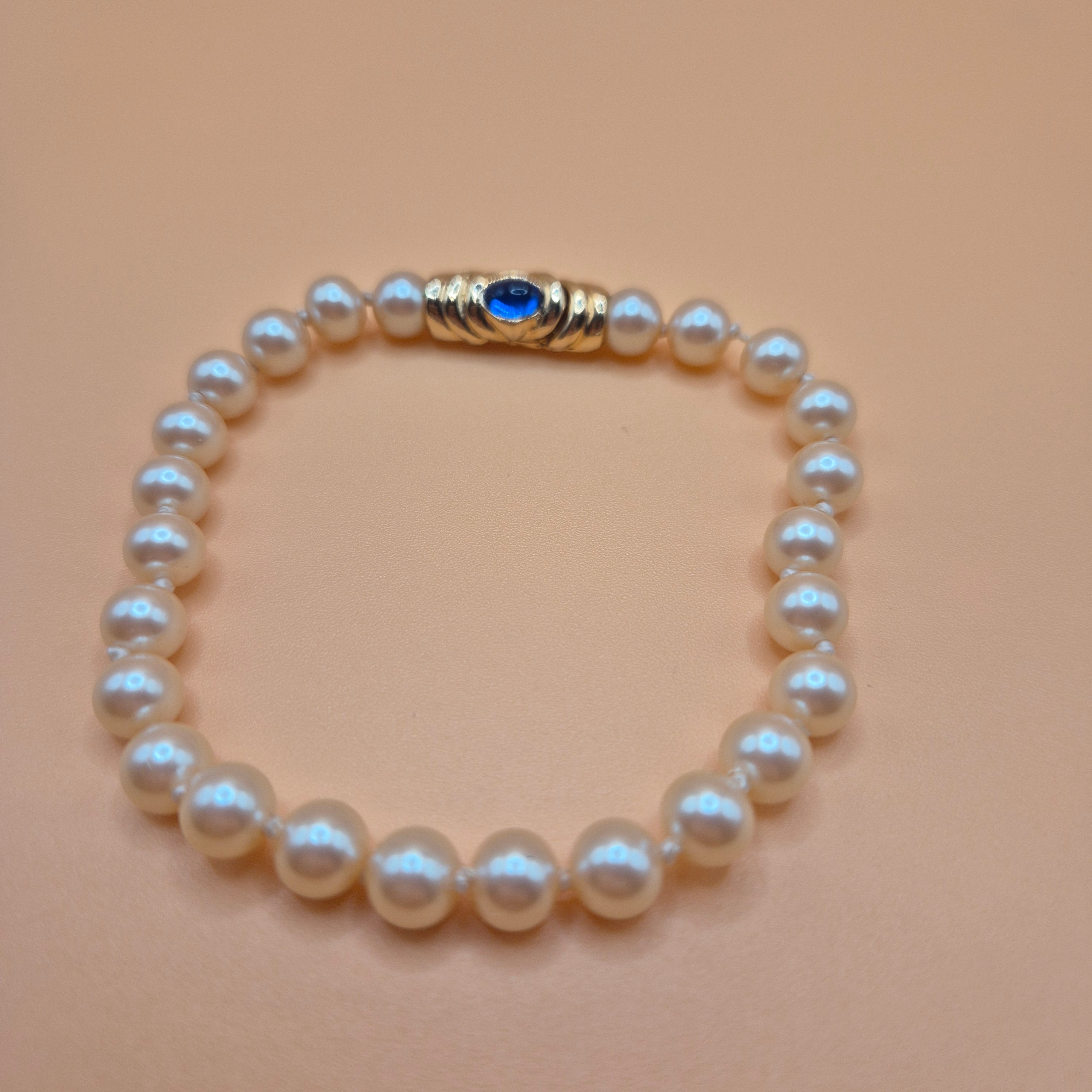 Vintage unechtes Perlenarmband mit blauem Stein 80er Jahre