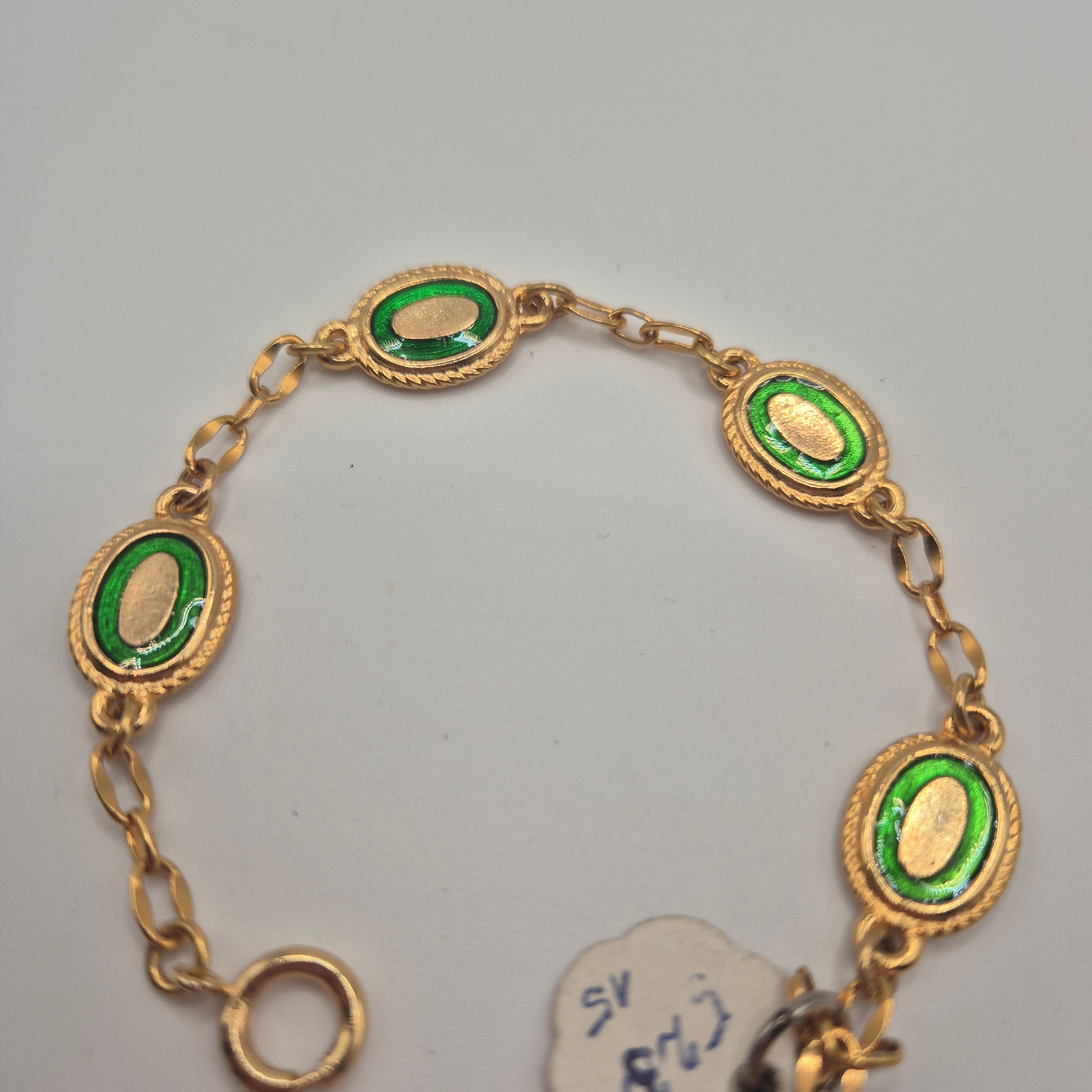 Goldenes Vintage Armband mit grünen Emaille-Ovalen 70er Jahre
