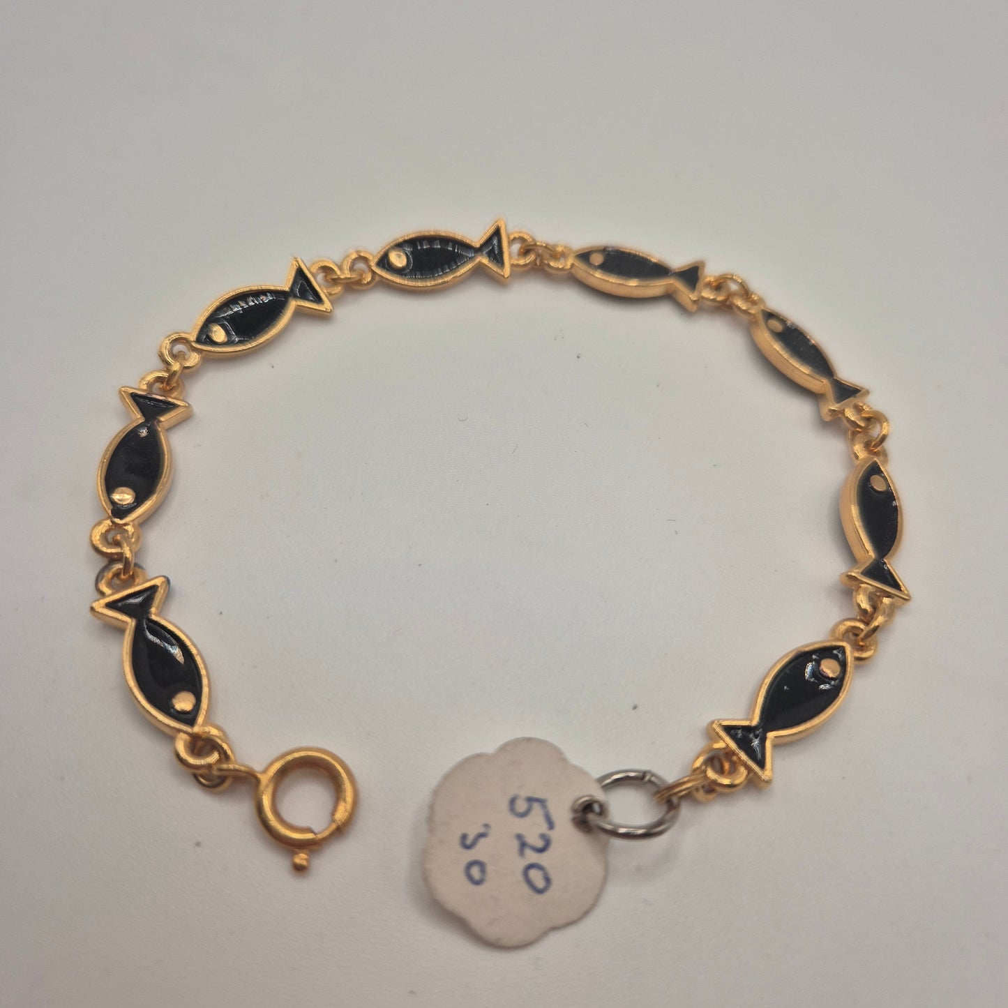 Goldenes Vintage Armband mit schwarzen Emaille-Fischen 70er Jahre