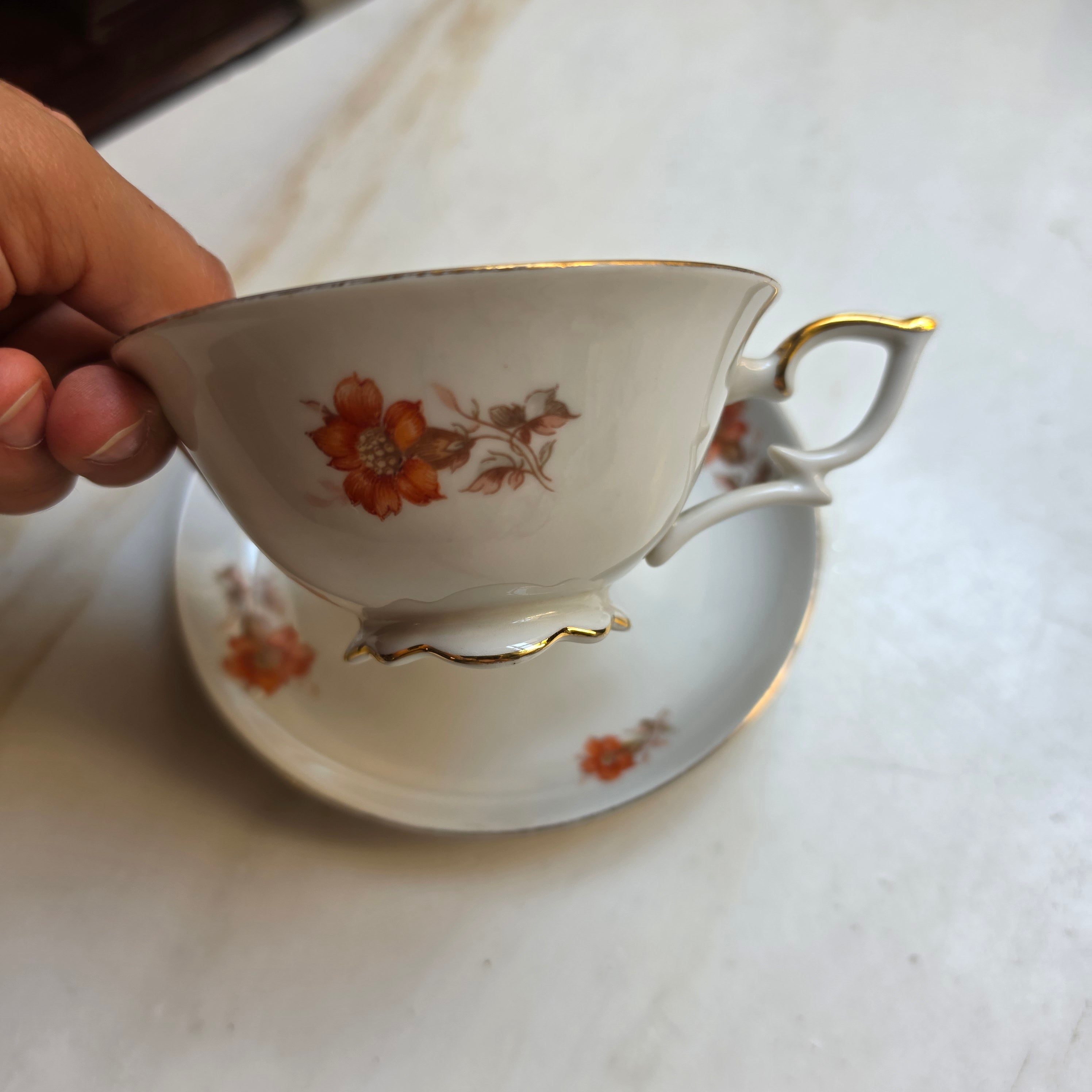Vintage Porzellan Sammeltasse mit Untertasse – PMR Bavaria Jaeger & Co. | Florales Dekor in Orangerot & Goldverzierung