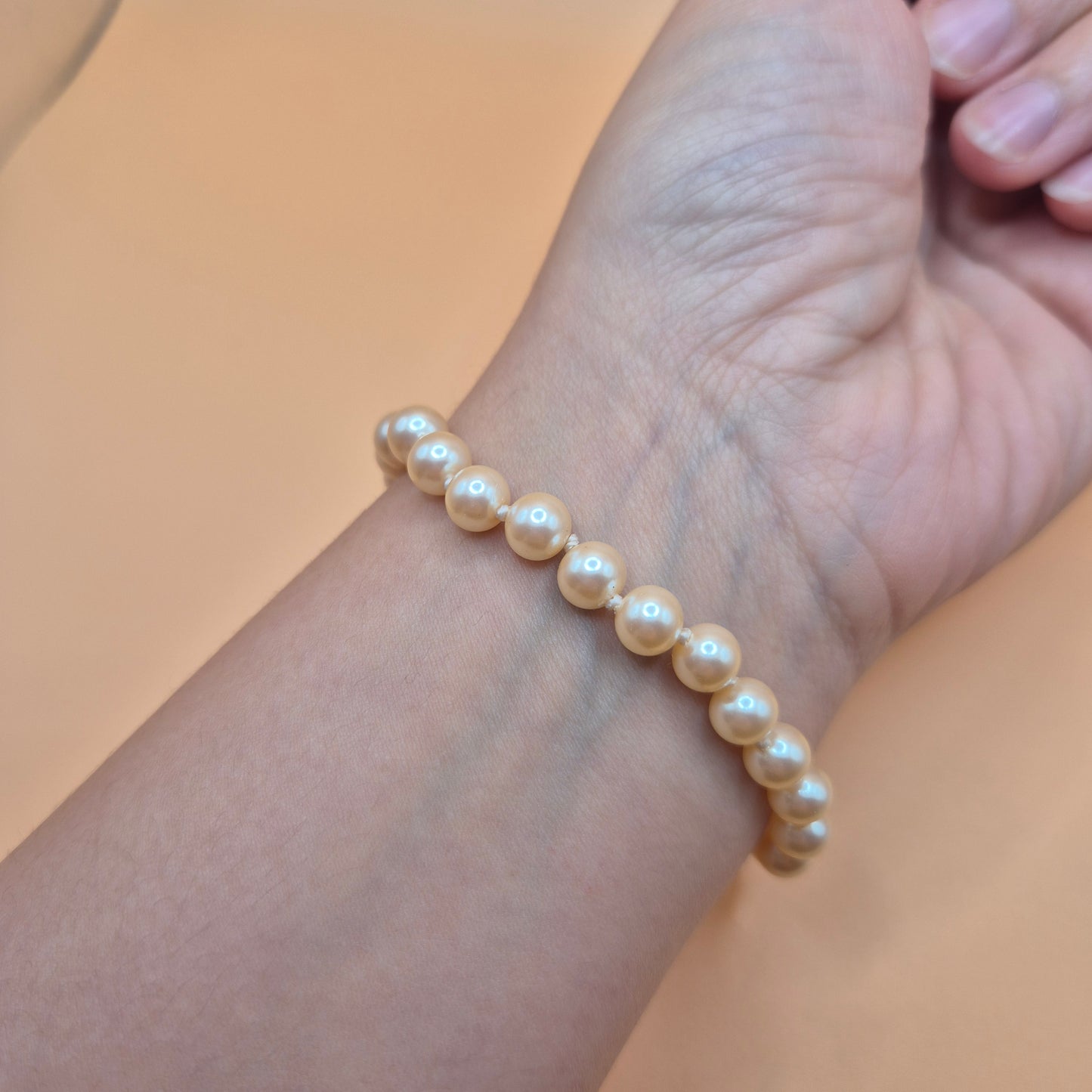 Vintage unechtes Perlenarmband mit blauem Stein 80er Jahre