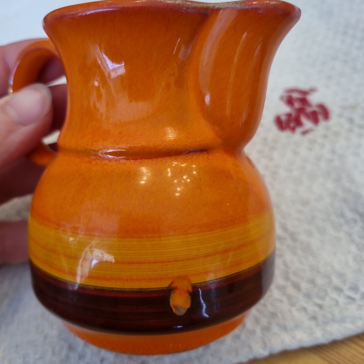 Kleine Retro vintage Milchkanne Krug orange Vase