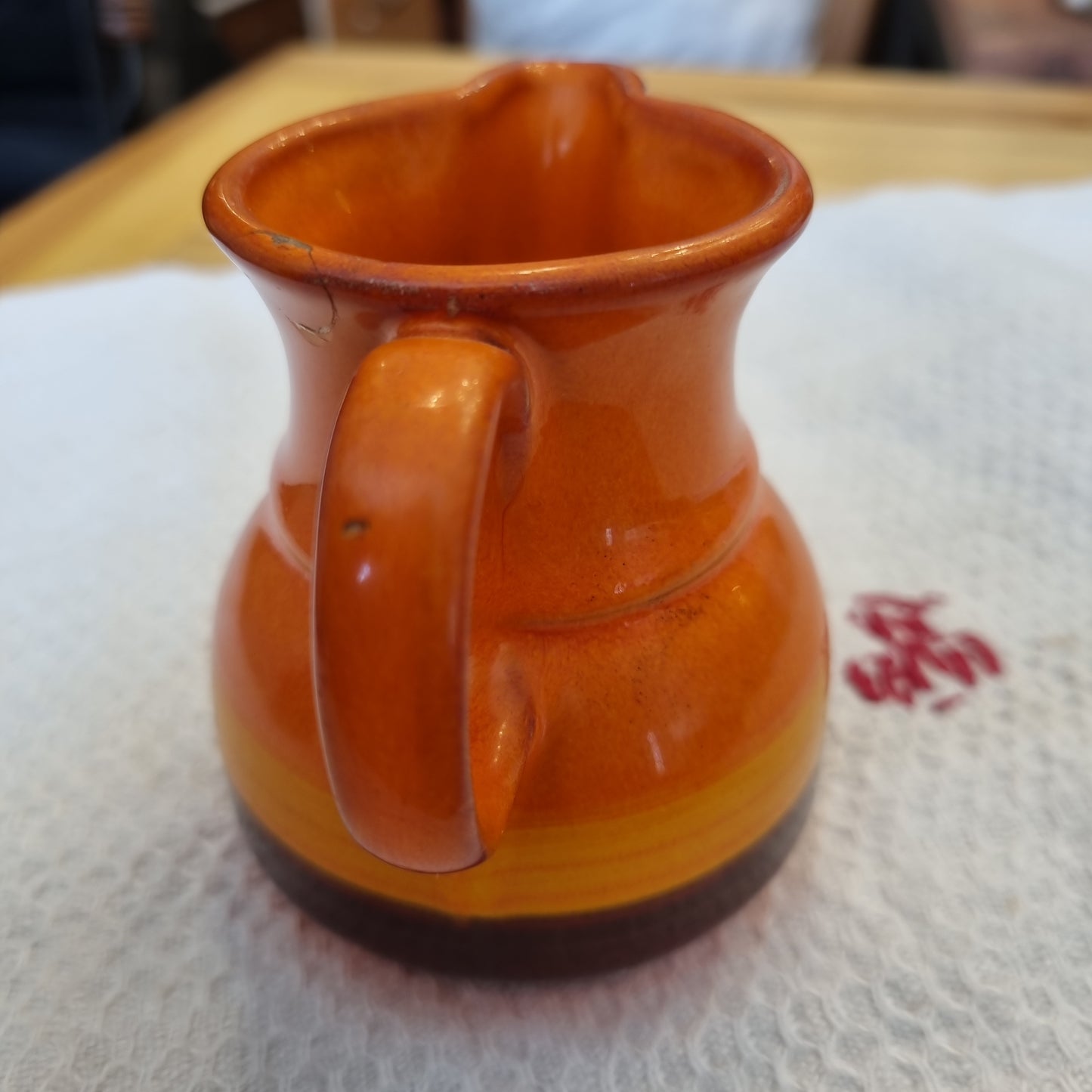 Kleine Retro vintage Milchkanne Krug orange Vase